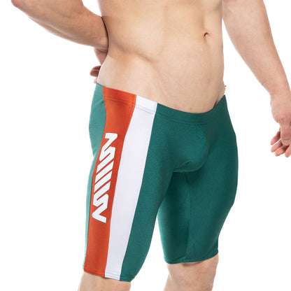 Green swim trunks with bold orange and white vertical stripe and white stylized z logo by metromalewear