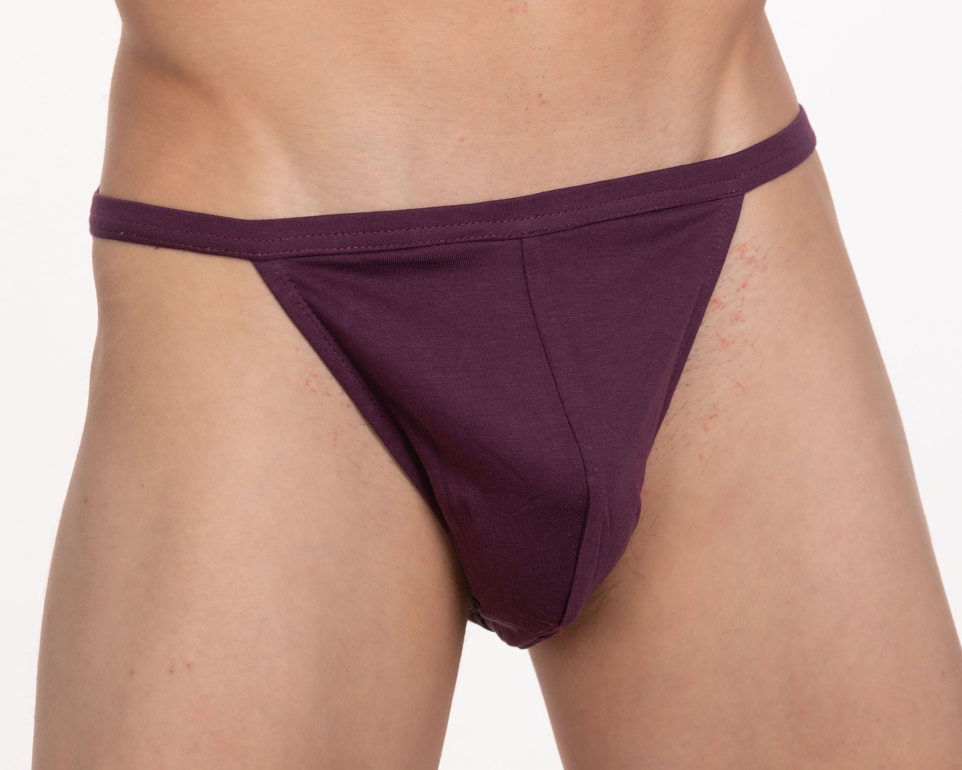 Purple thong from 5 pack contour cutaway bikini made of smooth stretchy 100 percent cotton fabric with simple design