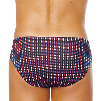 A pair of papi low rise bikini bottoms in size medium with bold red blue and white vertical stripes on navy base