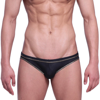 Black metroMalewear faro jock strap swim trunks with thin metallic gold trim on waistband and legs