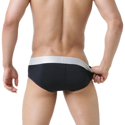 MetroMaleWear basico brief black swim trunks featuring a sleek silver waistband for stylish comfort