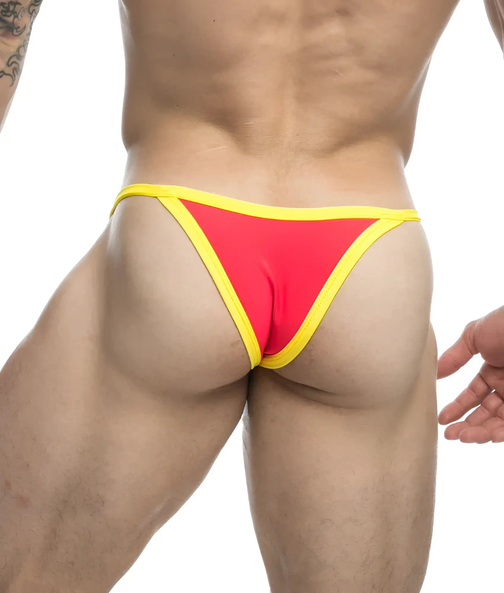 Vibrant red and yellow thong from justin and simon bikini one with a snug form-fitting design shown from the back