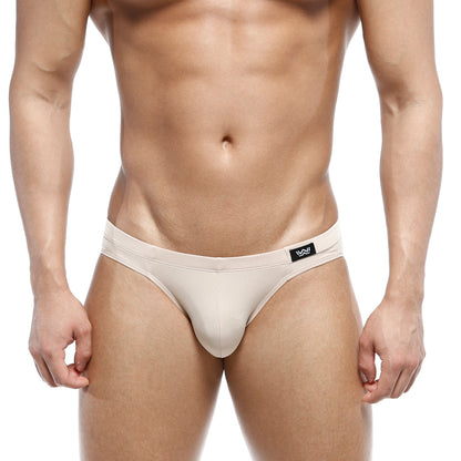 Beige metro male wear vasco hip brief men’s thong with black logo tag on waistband in soft breathable fabric