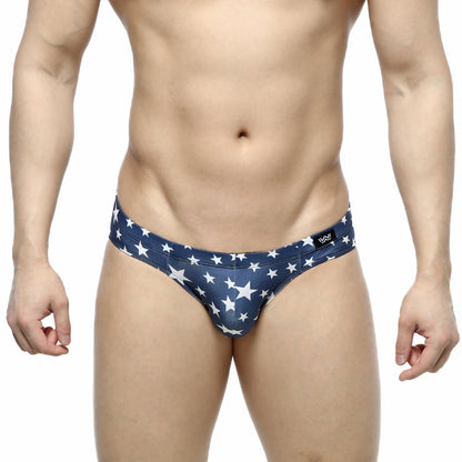 Navy blue MetroMaleWear Estella Bikini 5103-14 swim trunks with white star pattern for men’s beachwear