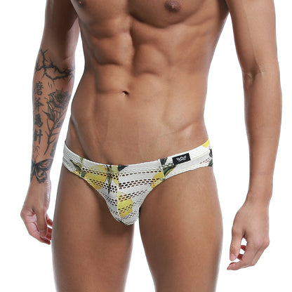 White and yellow patterned mesh swim trunks with black logo tag by metromalewear mango bikini 5103-36