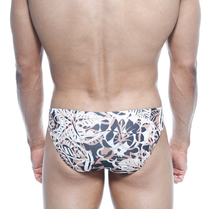 MetroMalewear vasco hip brief hoja 5103-76 men’s swim trunks with bold black white and beige tropical leaf pattern