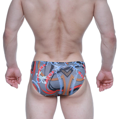 Gray swim trunks by metromalewear padu bikini 5103-m34 with bold red orange blue chain pattern and decorative bows
