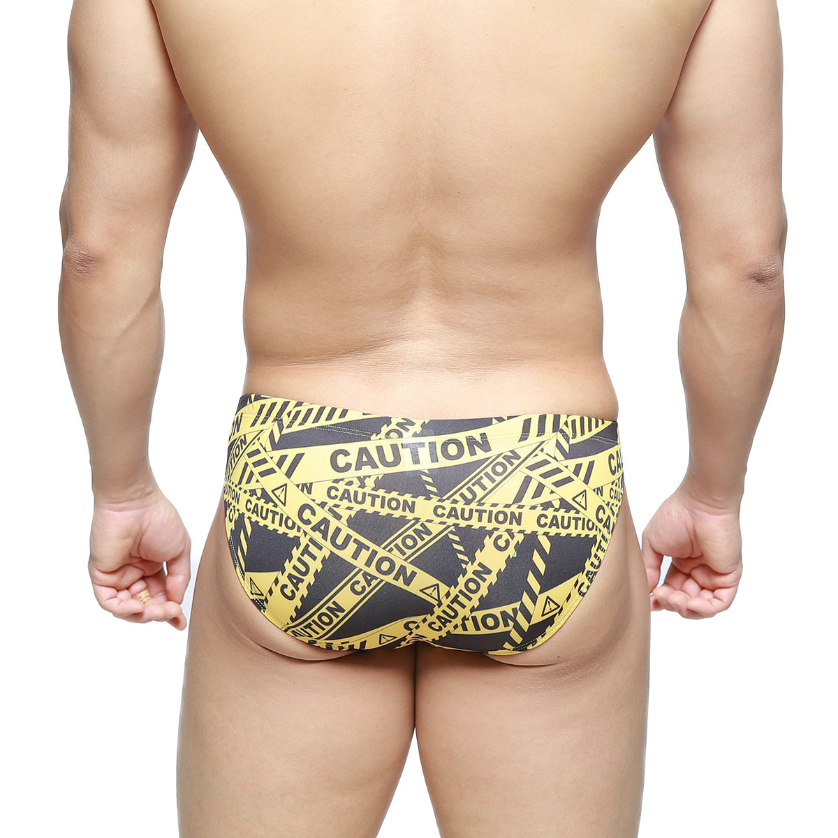 MetroMaleWear caution bikini swim trunks in yellow and black caution tape pattern for bold beachwear style