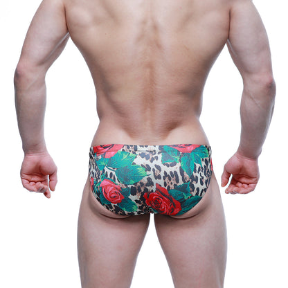 MetroMaleWear Rosee Bikini 5103-M81 leopard print swim trunks with vibrant red roses and lush green leaves design
