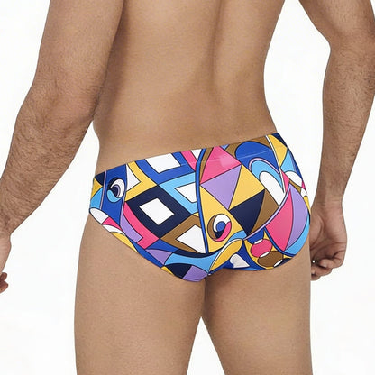 MetroMaleWear Picasso Bikini 5103-M87 vibrant geometric swim trunks in bold blues pinks yellows and purples