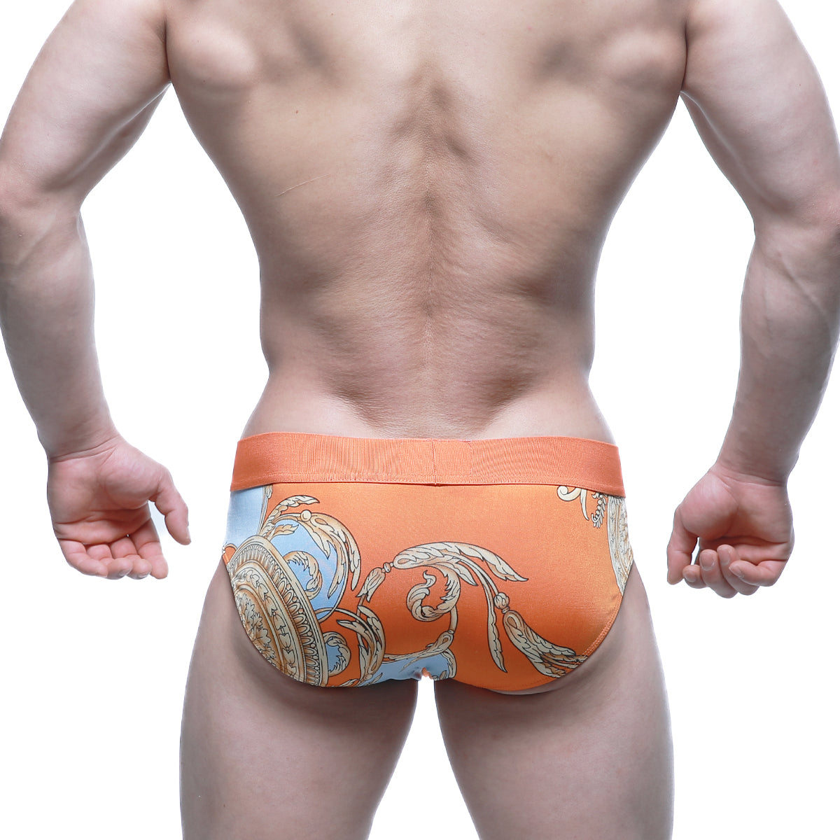 Orange men’s briefs with blue and gold ornate pattern by metro malewear model narangja brief 5203-24