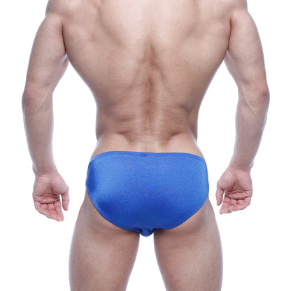Bright blue metro malewear eureka bikini swim trunks with smooth slightly shiny fabric and form-fitting design