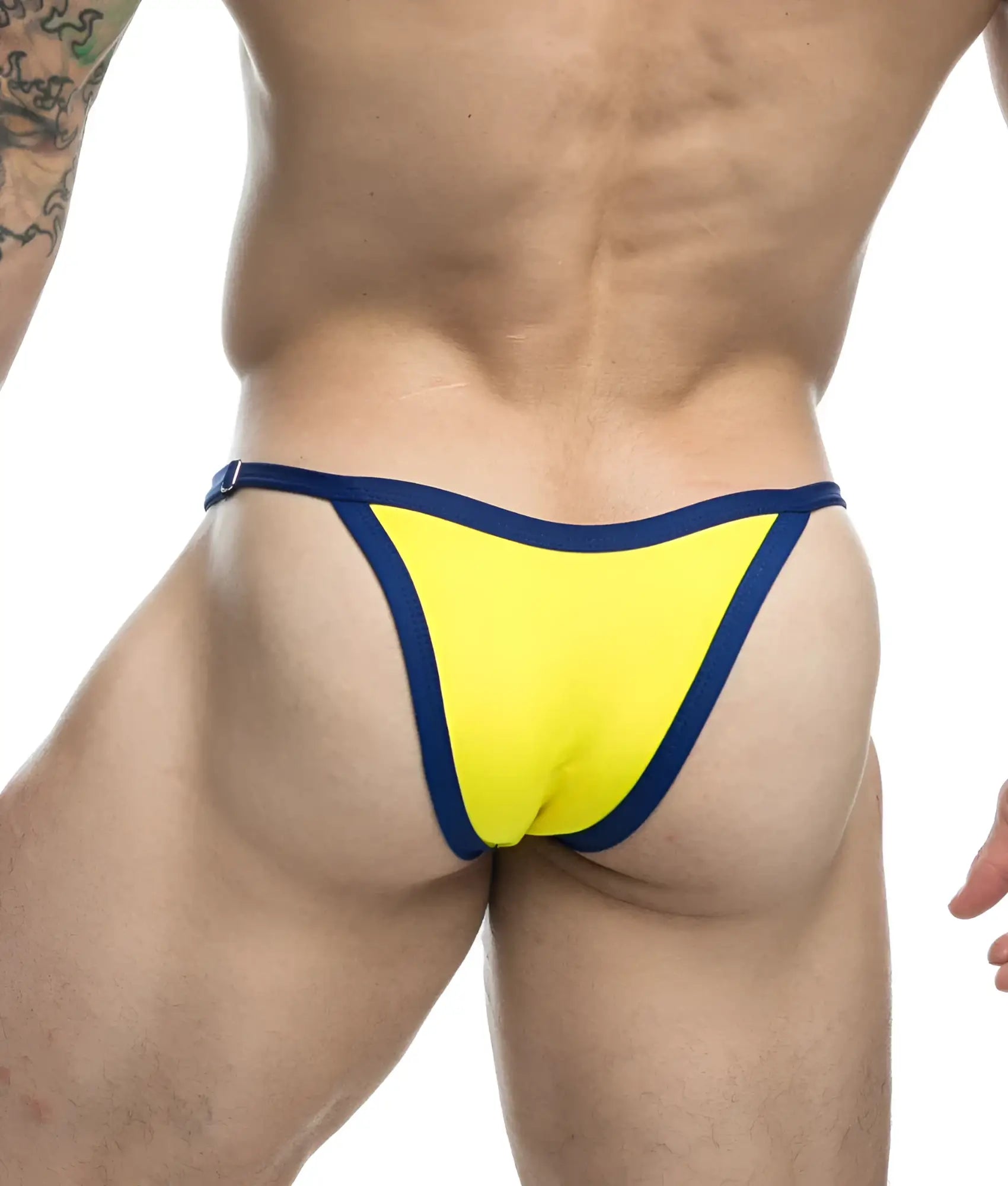 Bright yellow Justin + Simon bikini thong with navy blue trim showing the front side of the swimwear