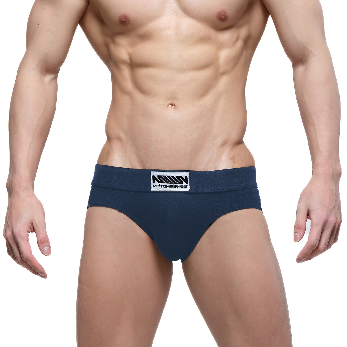 Navy blue MetroMaleWear Deseo brief with white logo patch on waistband made from soft breathable fabric