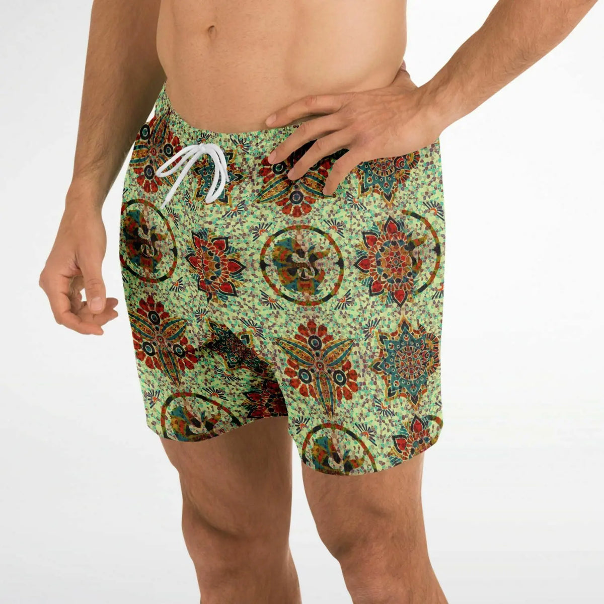 Men's swim shorts by Maris Equi in green with a colorful mosaic pattern featuring an elastic waistband and drawstring.