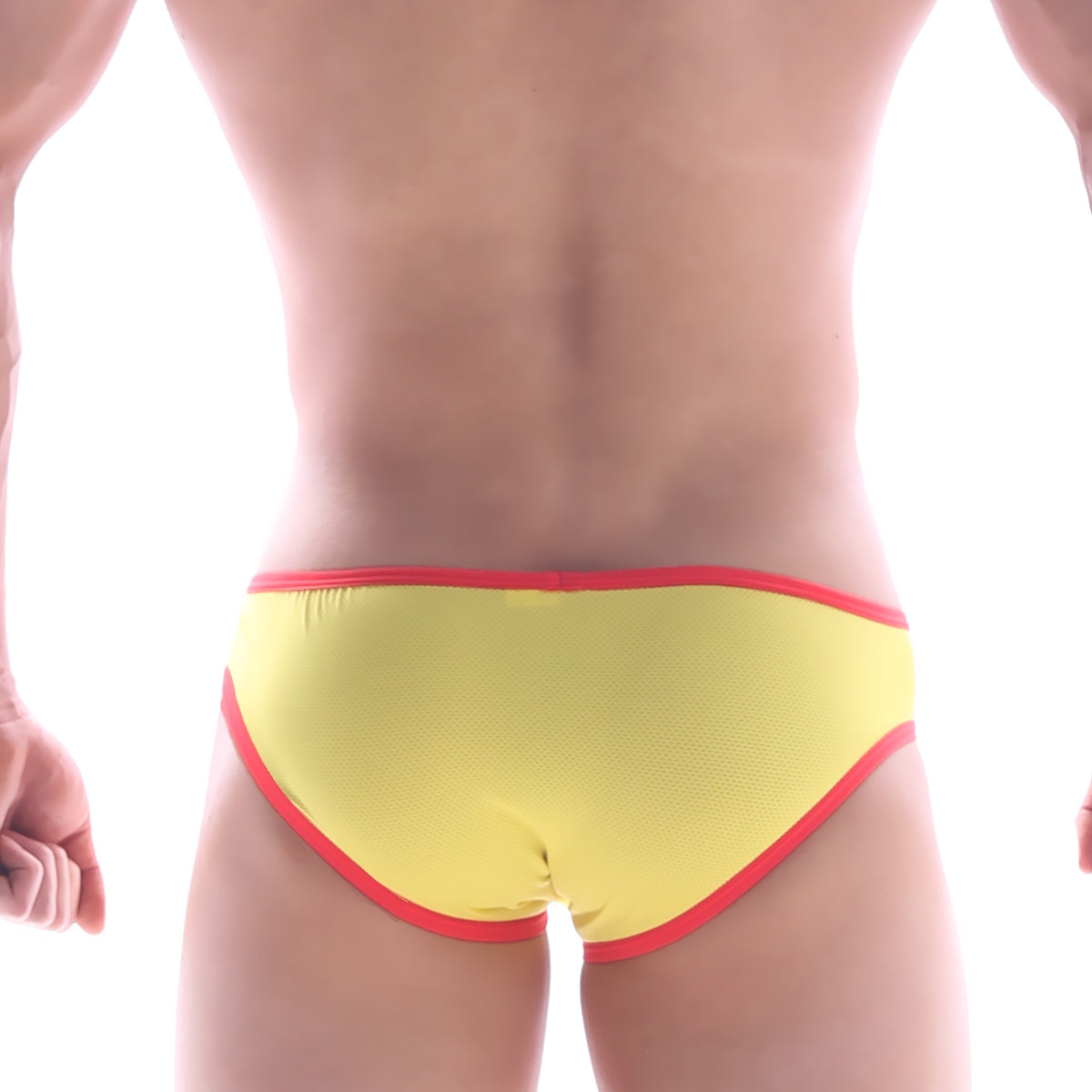 Yellow mesh bikini swim trunks with bold red trim from MetroMaleWear model 6105-15