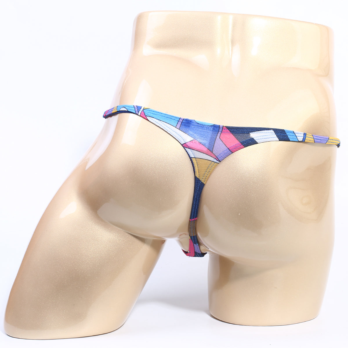 A vibrant geometric-patterned MetroMaleWear Fantasy Thong Picasso 6112-87 in blue pink and yellow with thin elastic waistband