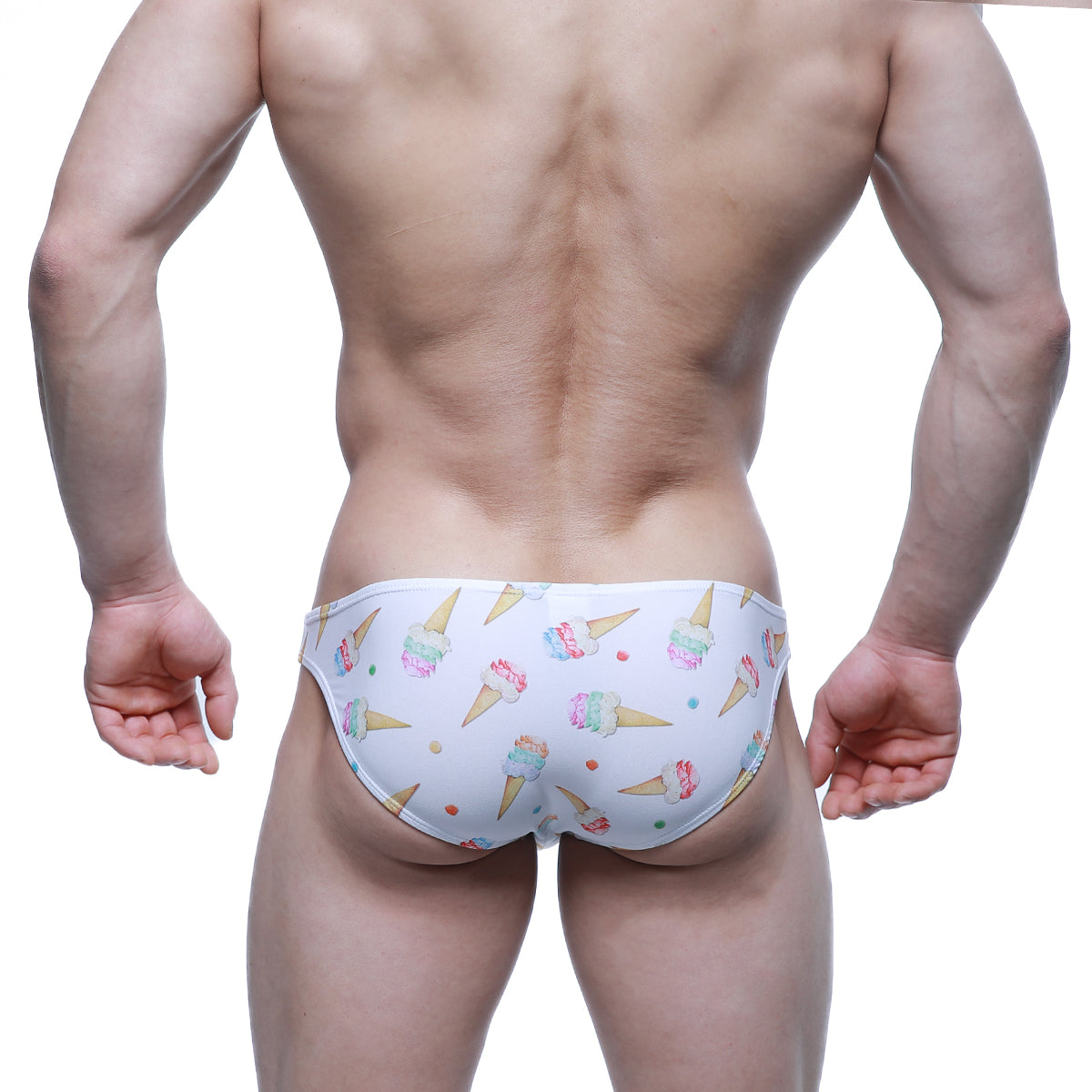 White swim trunks by metromalewear featuring a playful colorful ice cream cone and sprinkle pattern for summer wear
