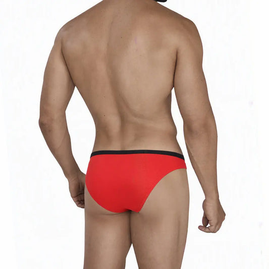 Red men's bikini swimwear with a black waistband shown from the back on a model by MetroMaleWear M2W