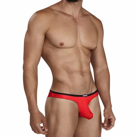 Red bikini underwear with a snug fit and a contrasting waistband worn by a model showcasing its sleek design by MetroMaleWear M2W