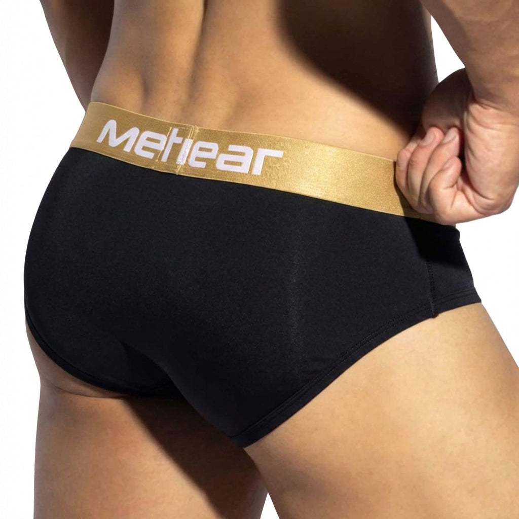 Black meheear briefs with gold waistband featuring white lettering from metromalewear panel bikini black 6205-20 product