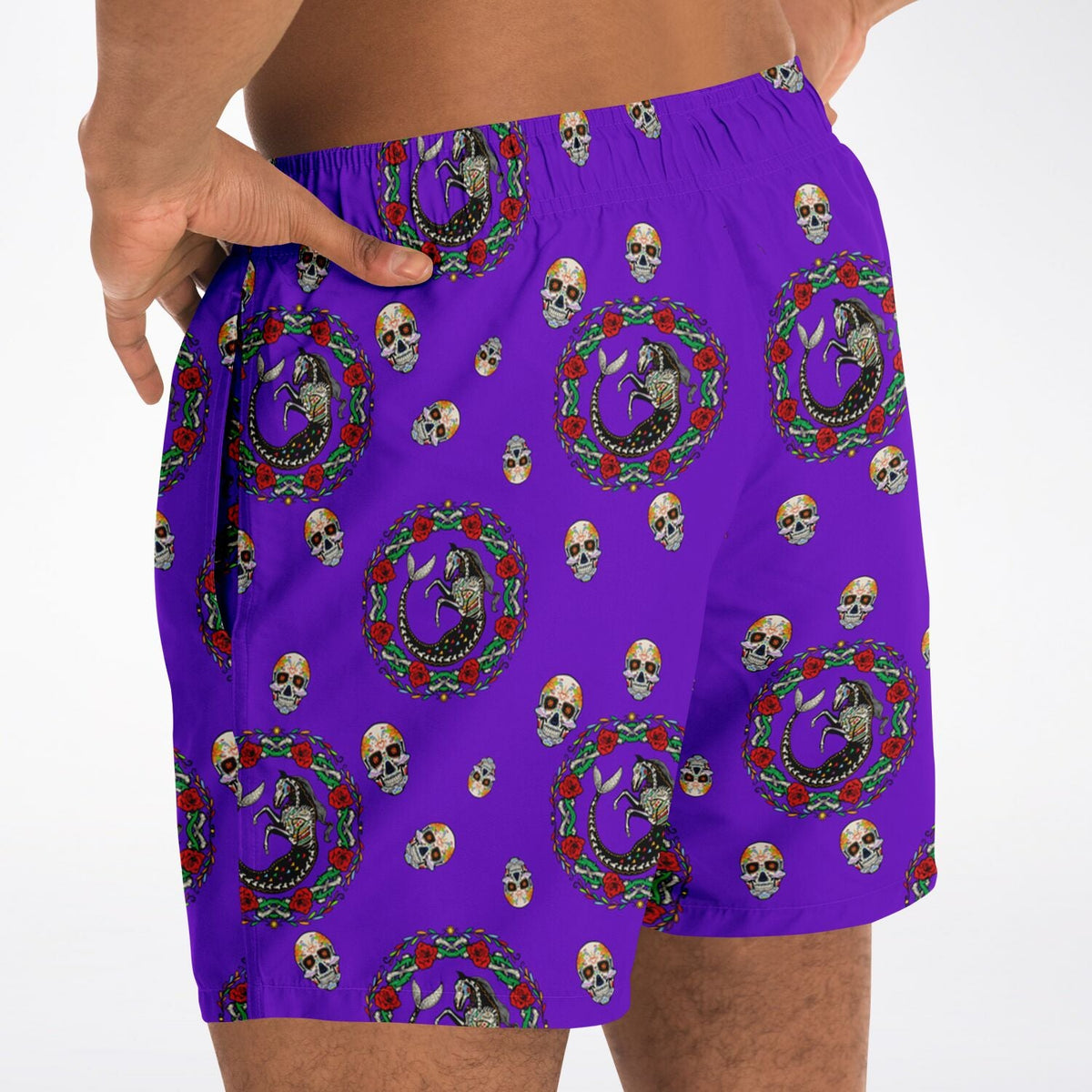 Men's purple swim shorts by Maris Equi featuring a Day of the Dead skull and floral pattern elastic waistband and relaxed fit.