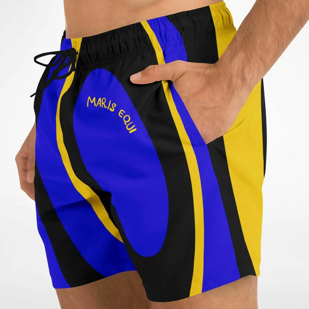 Men's swim shorts in blue black and yellow with a surgeonfish print featuring an elastic waistband and side pockets by Maris Equi