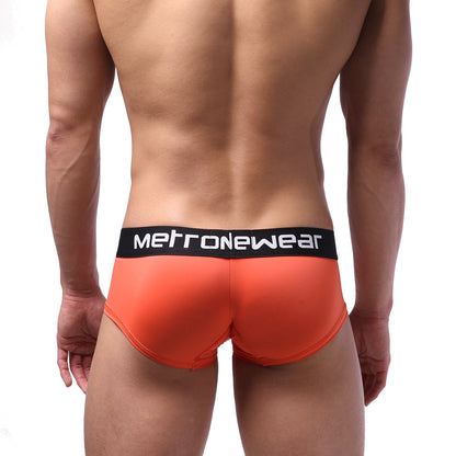 Bright orange microfiber men’s briefs with black waistband featuring metronewear logo metro malewear mini boxer coral