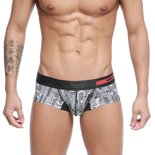 Metro male wear micro mini boxer briefs with black and white cityscape pattern and red logo waistband