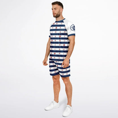 Nautical striped shorts and top set in navy and white featuring red accents worn by a model by Maris Equi.