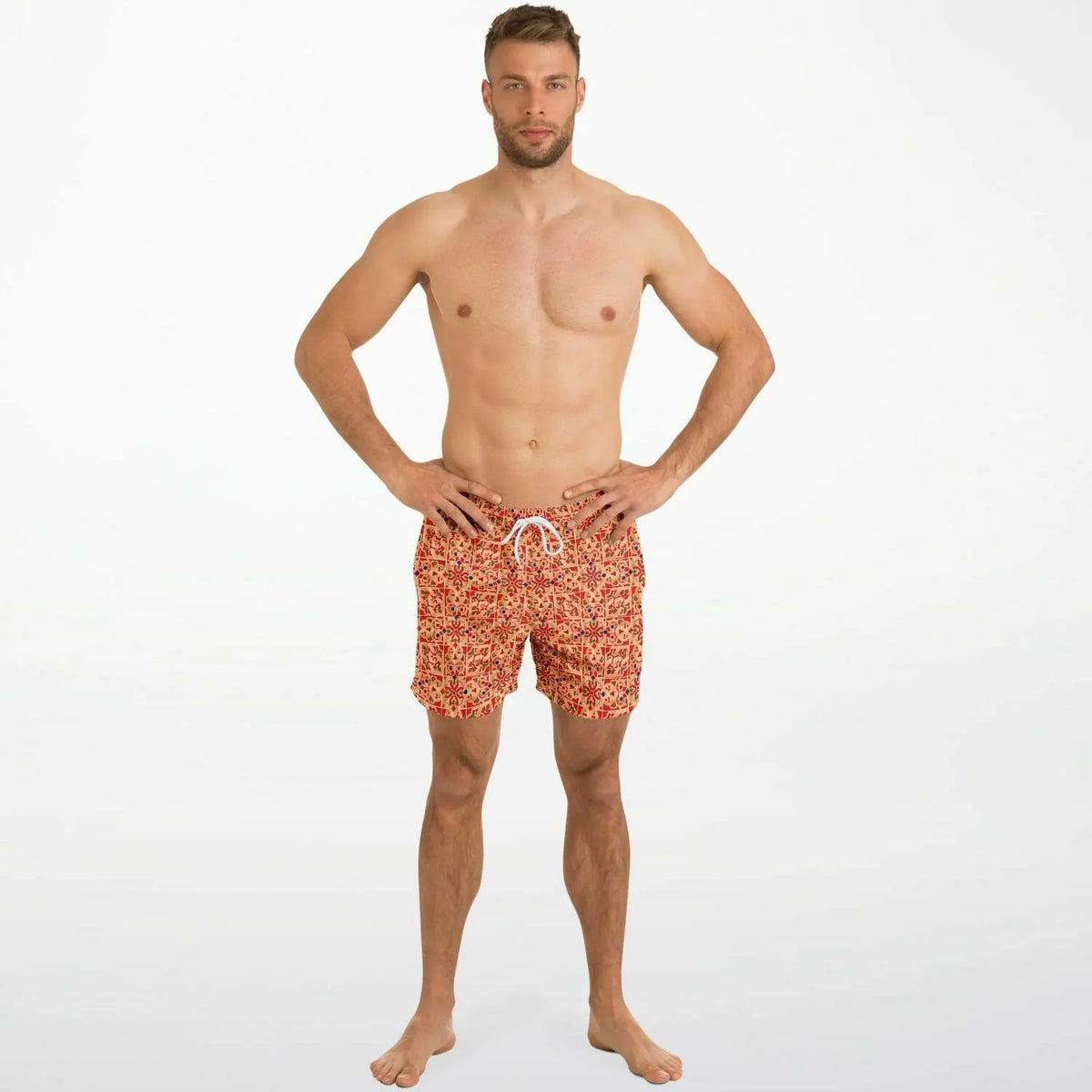 Men's swim shorts in a vibrant red floral pattern made by Maris Equi featuring an elastic waistband and drawstring.