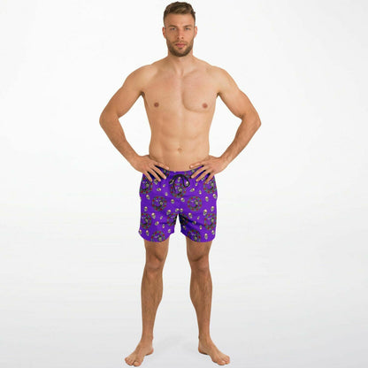 Men's purple swim shorts with Day of the Dead print featuring an elastic waistband by Maris Equi