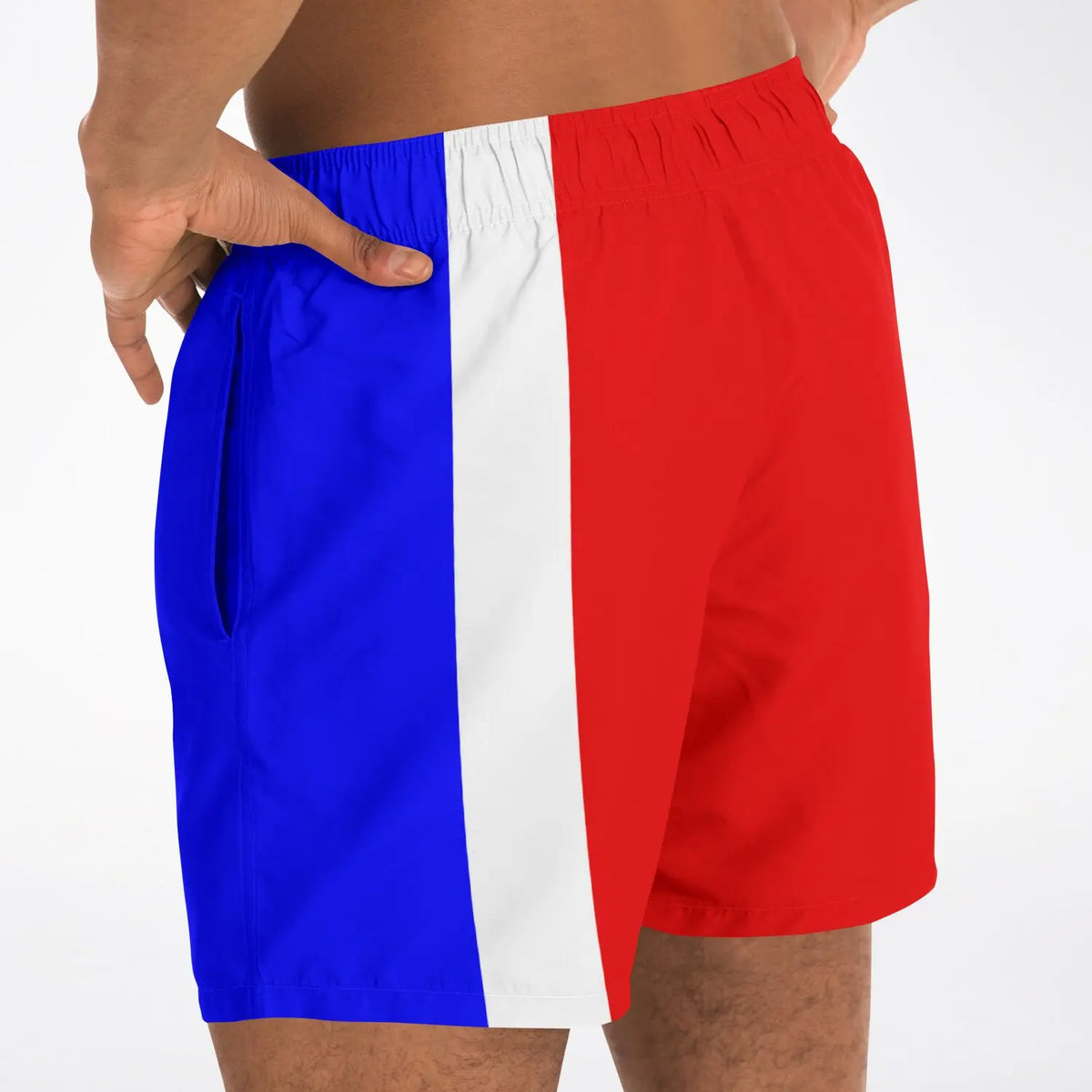 Men's swim shorts by Maris Equi in red white and blue with an elastic waistband and side pockets.