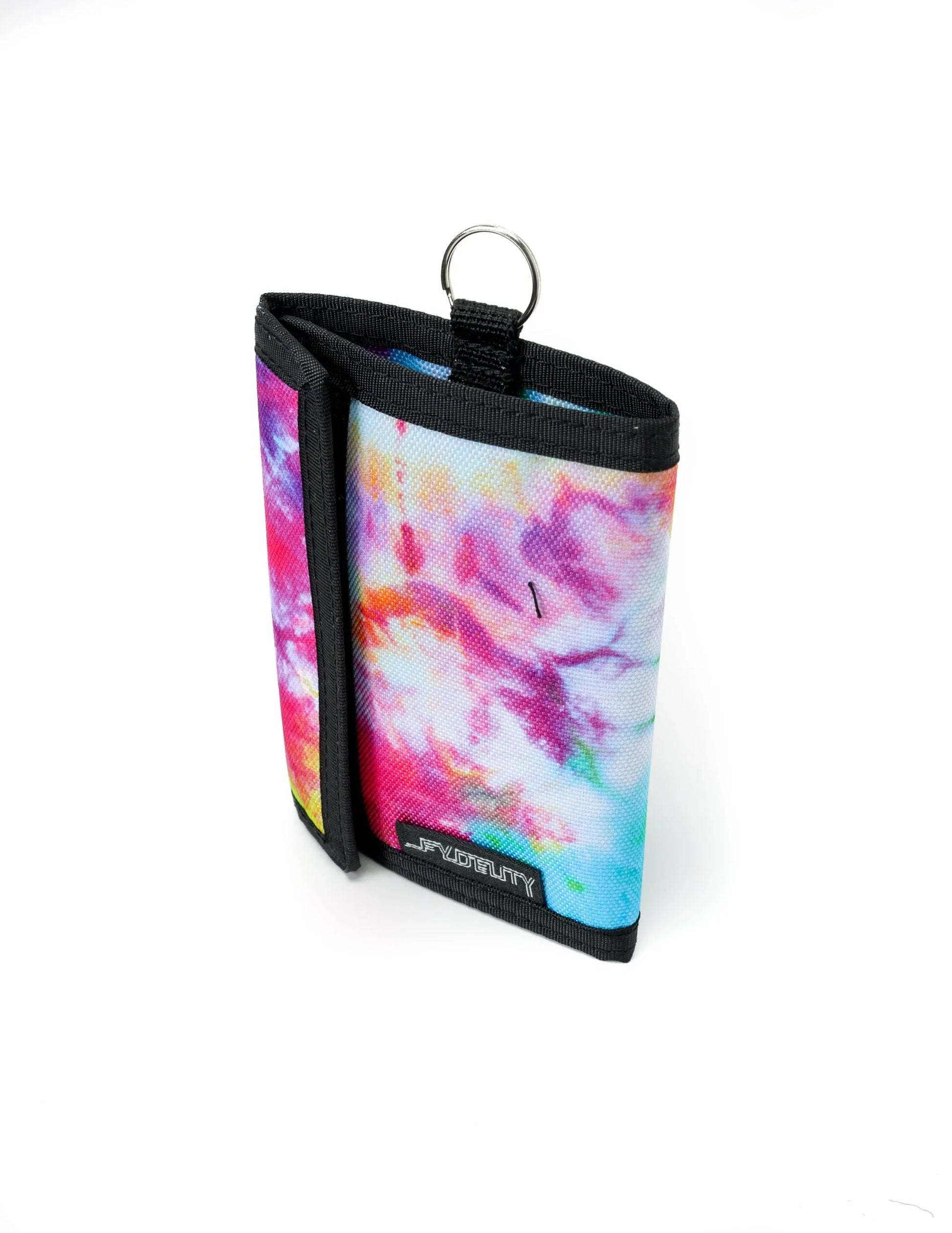A vibrant tie-dye 80s velcro tri-fold wallet with black trim and metal ring attachment for secure carrying