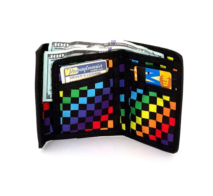 A vibrant rainbow checkered 80s velcro trifold wallet with black edges and multiple card slots for organization