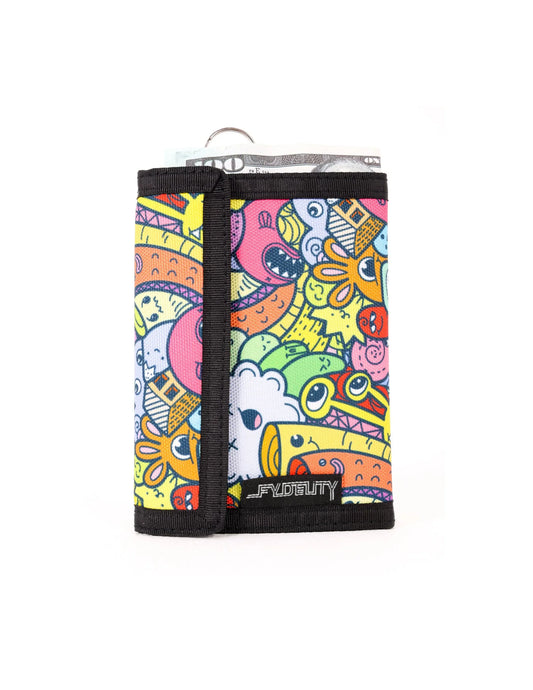 A vibrant cartoon patterned 80s velcro tri fold wallet with black trim and a silver metal ring at the top