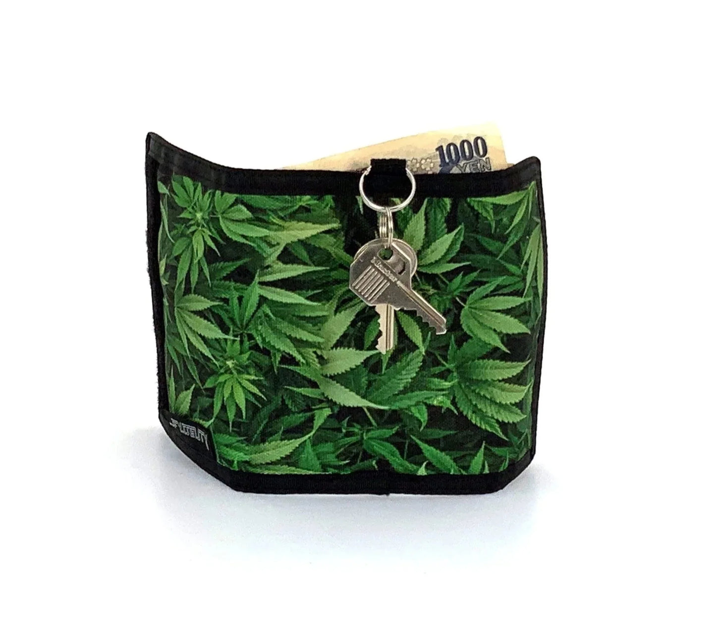 80s veclro wallet with green cannabis leaf pattern black trim and attached keychain for easy carrying
