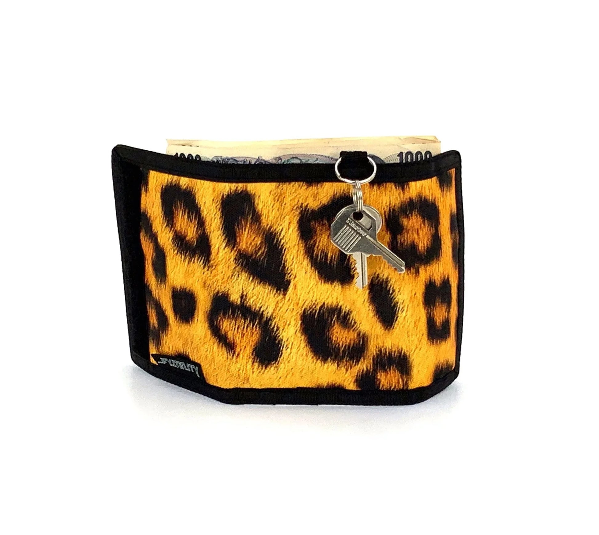 A vibrant yellow and black leopard print 80s velcro wallet with sleek black border and front keychain attachment