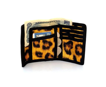 A black and gold leopard-print 80s velcro wallet with a textured faux-fur finish and tri-fold design