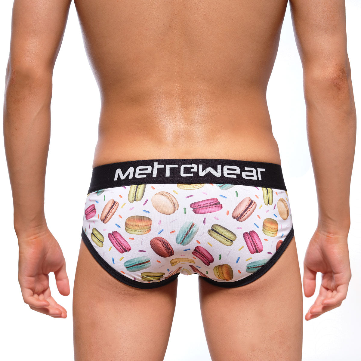 White briefs with colorful macaron pattern and black trim featuring metrowear brand on waistband for men