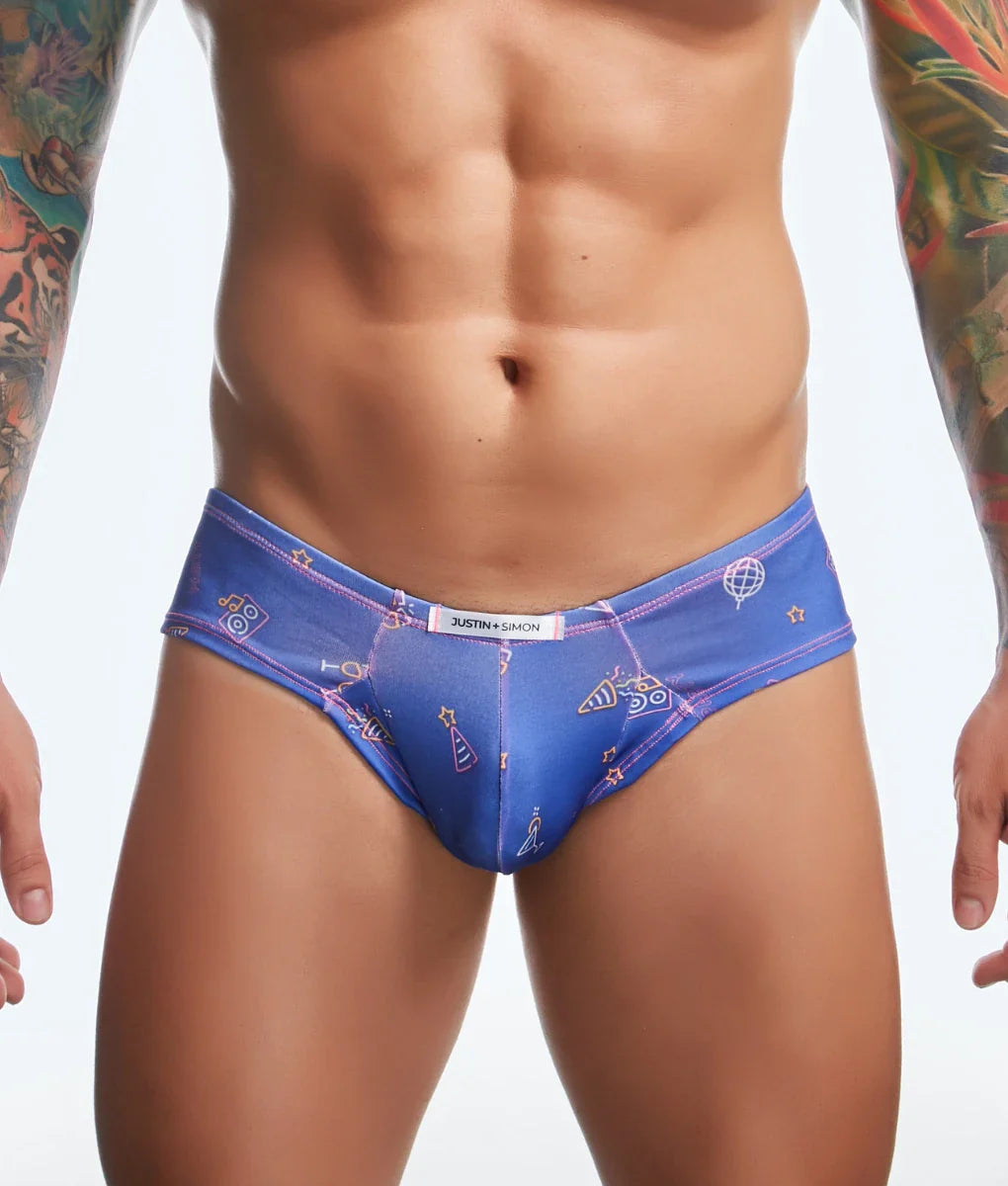 Blue justin and simon men’s briefs with playful scientific icons and stars pattern in pink white and yellow