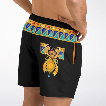 Black men's swim shorts by Maris Equi featuring a colorful bejeweled waistband and decorative sun design on the side.