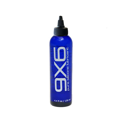 A sleek blue bottle of axe pure silicone lubricant with a black cap and white lettering labeled 9x6 lube