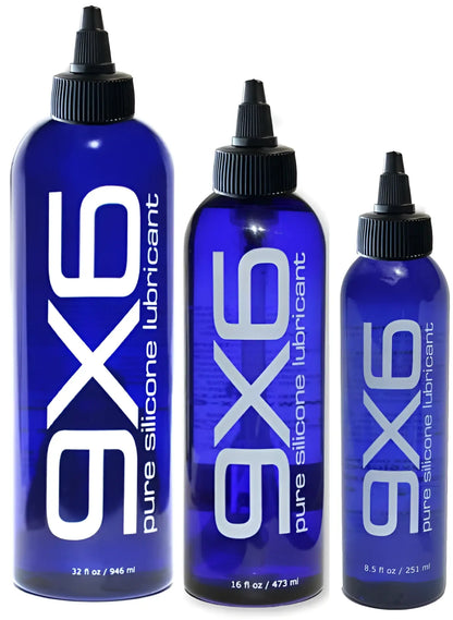 Three blue bottles of ax6 pure silicone lubricant with black caps and white labels in 9x6 lube product set