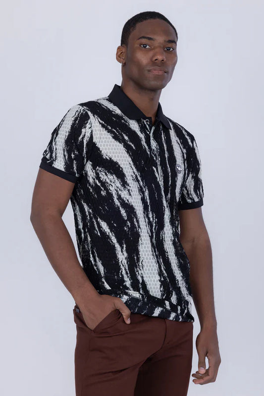 Black and white abstract polo shirt with textured mesh design on the torso for a modern casual look
