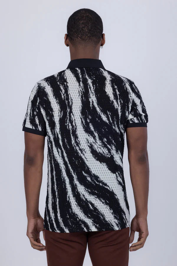 Black and white zebra-striped abstract polo shirt with textured woven pattern for stylish casual wear