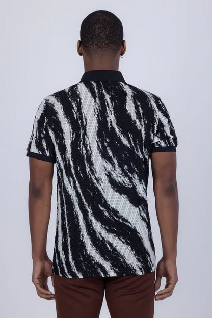 Black and white zebra-striped abstract polo shirt with textured woven pattern for stylish casual wear