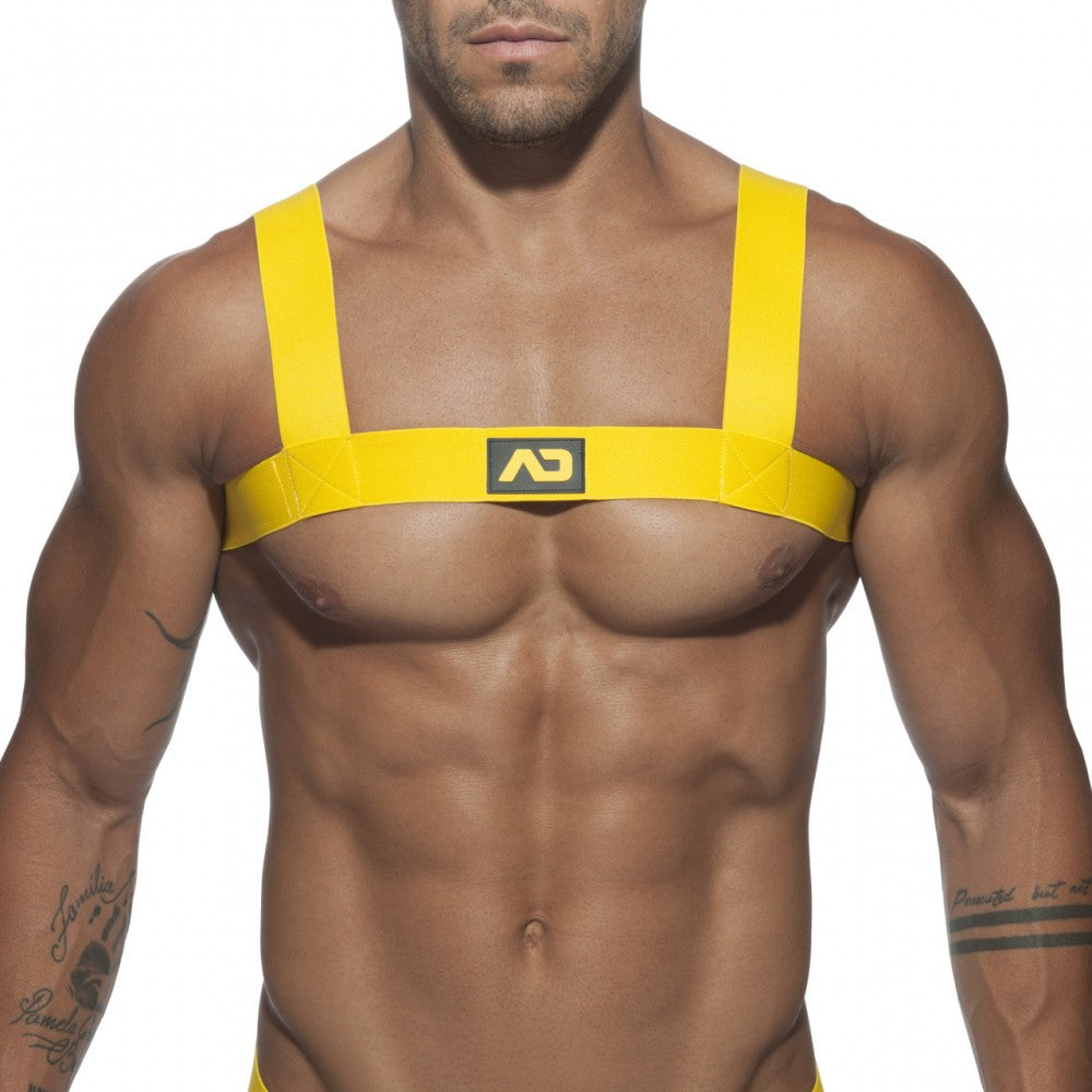 Bright yellow ad basic harness chest harness with bold straps and central logo patch for secure fit and style