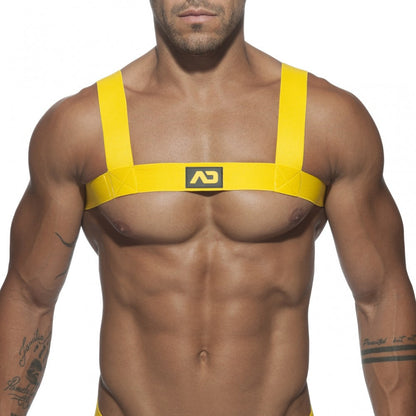 Bright yellow ad basic harness chest harness with bold straps and central logo patch for secure fit and style