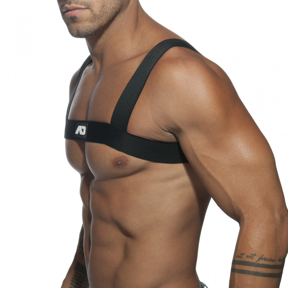 Black ad basic harness chest strap with adjustable shoulder straps shown from the back side